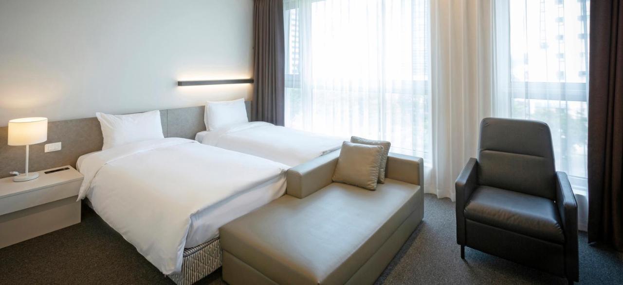 Grand City Hotel Чханвон Экстерьер фото