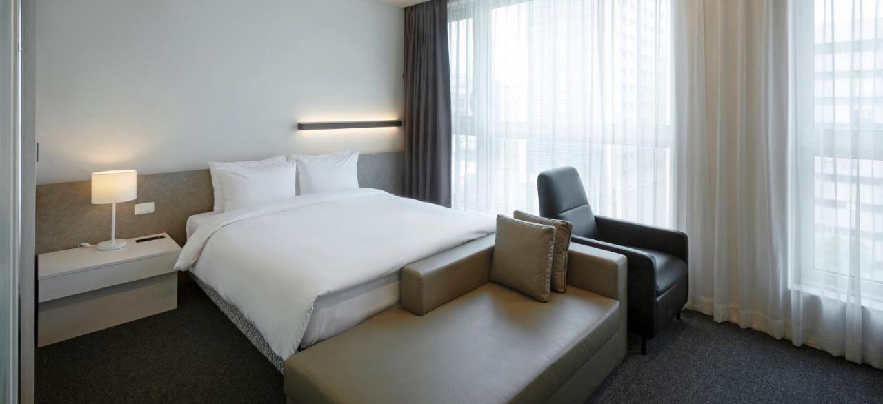 Grand City Hotel Чханвон Экстерьер фото