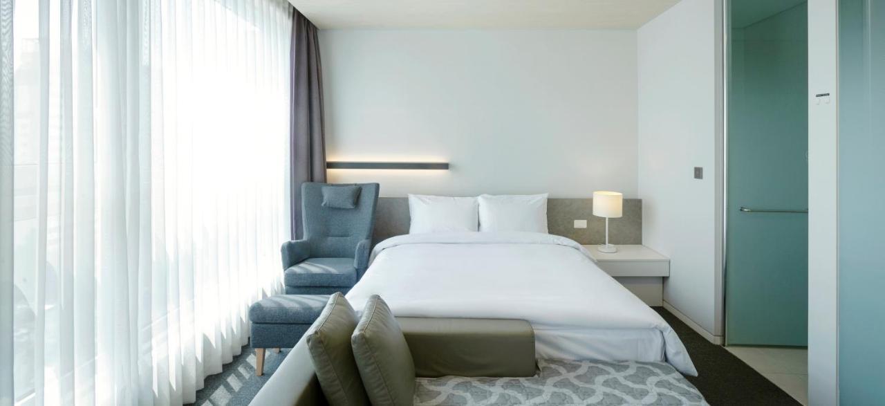 Grand City Hotel Чханвон Экстерьер фото