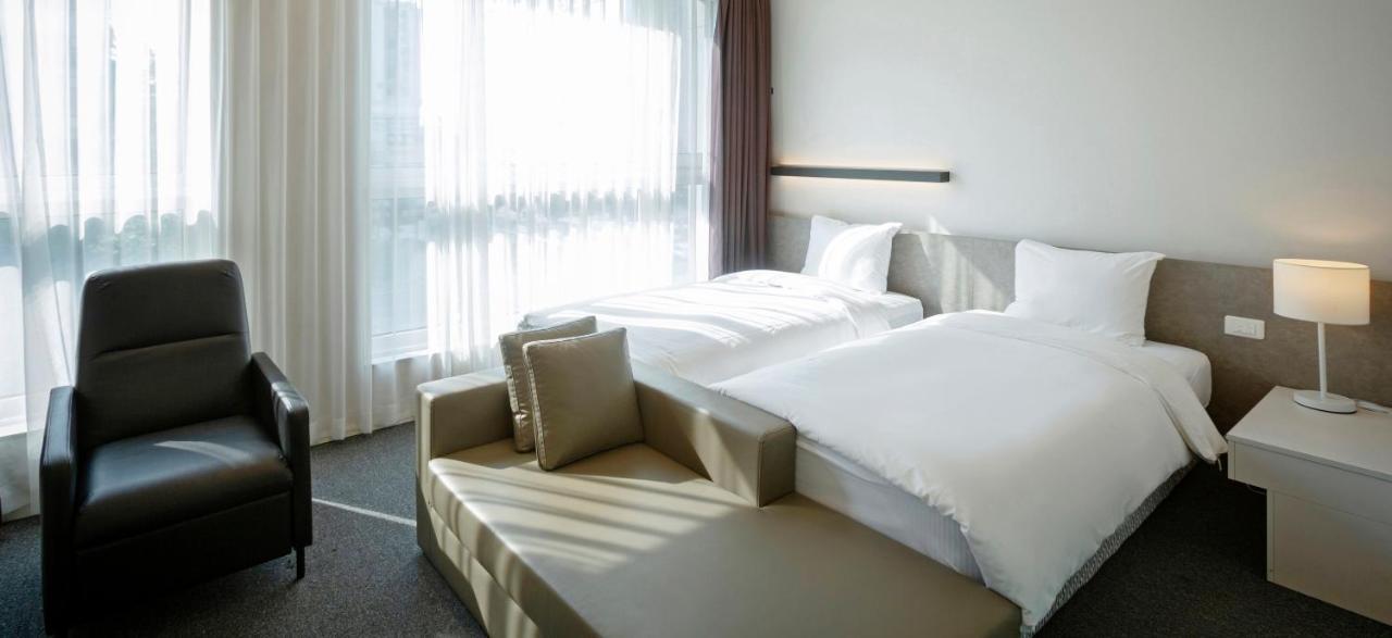 Grand City Hotel Чханвон Экстерьер фото