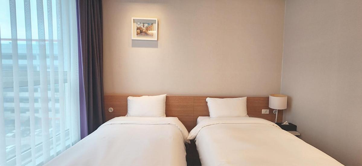 Grand City Hotel Чханвон Экстерьер фото